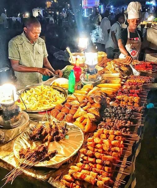 Night food market with grills